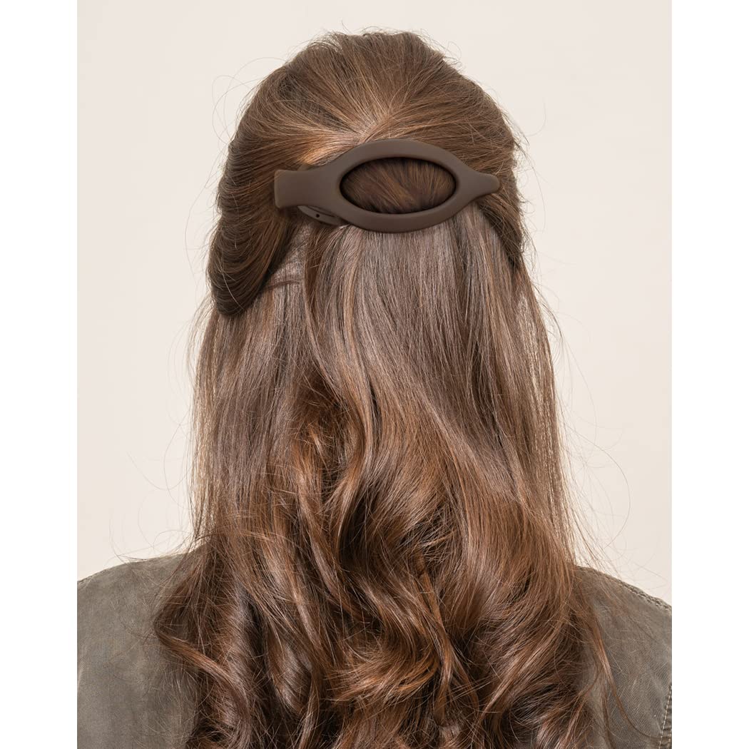 ATODEN clipped in hair in half-up style showing secure, neat hold
