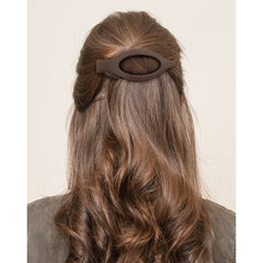 ATODEN clipped in hair in half-up style showing secure, neat hold