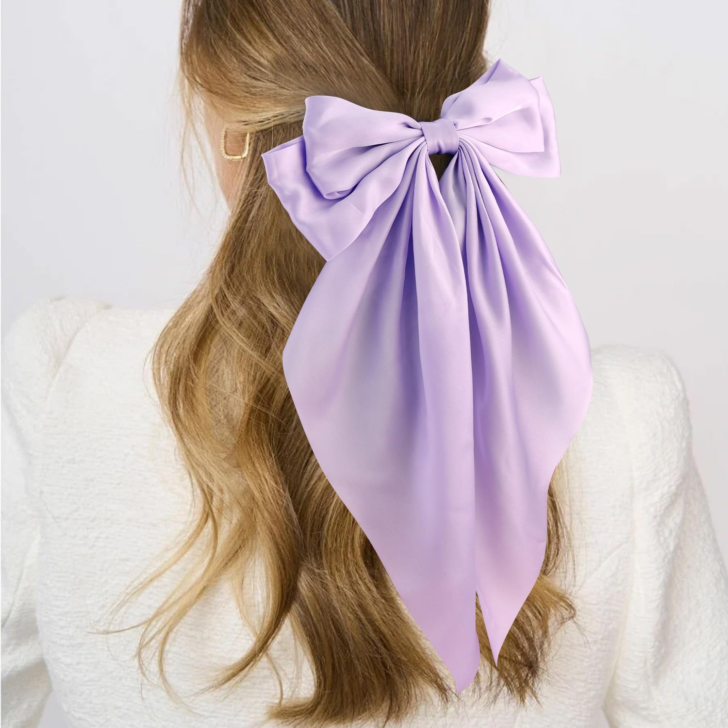 Atoden satin fabric close-up highlighting smooth lavender texture and sheen