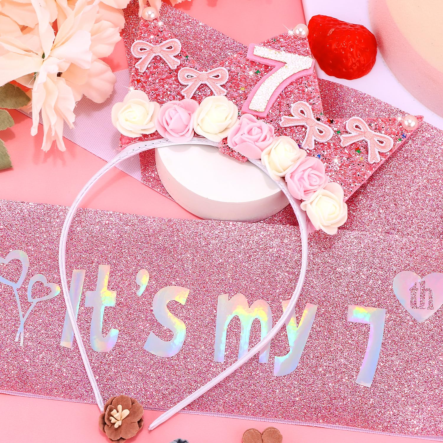 Atoden close-up of pearls and glitter texture emphasizing photo-ready sparkle