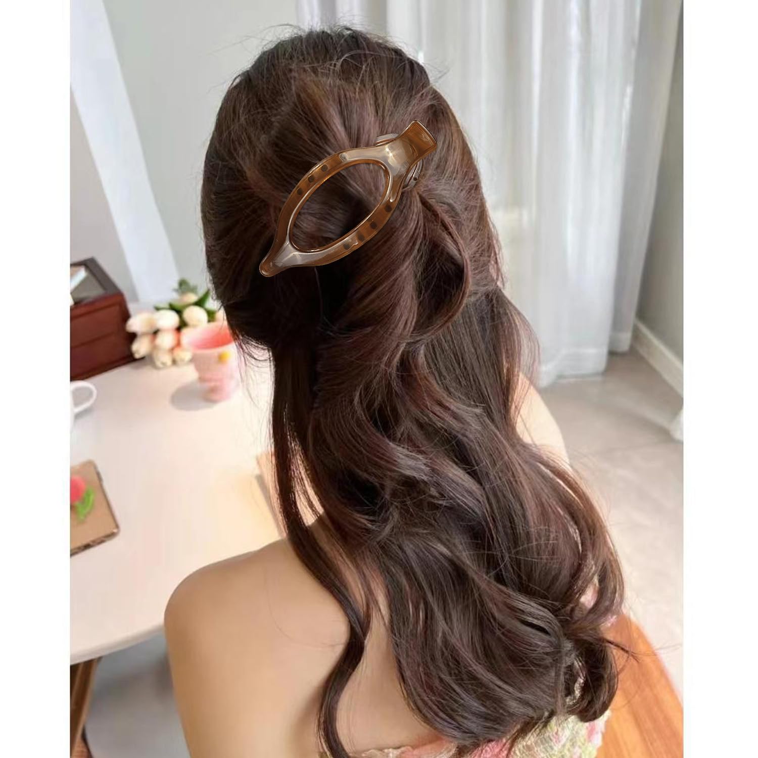 Atoden clip securing thick hair with strong hold benefit