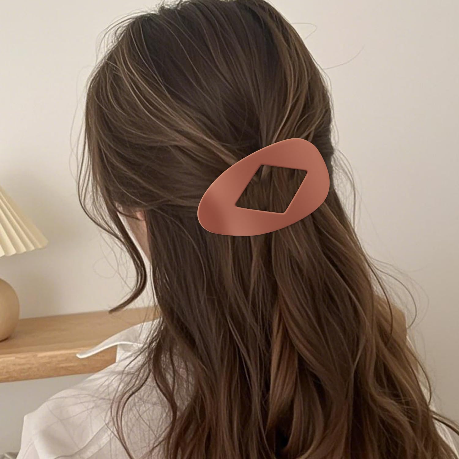 Atoden in use securing a half-up hairstyle for comfortable all-day wear