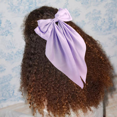 Atoden worn in a ponytail demonstrating long-tail flow and polished finish