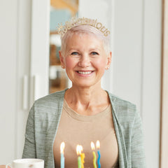 Atoden tiara scale on hand illustrating compact size and portability
