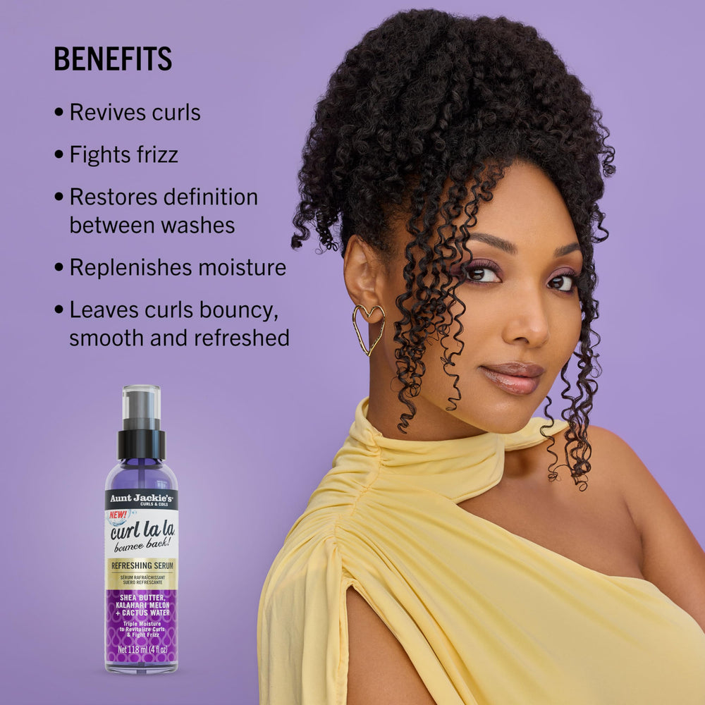 Aunt Jackie's applying serum to mid-lengths, restores curl definition benefit