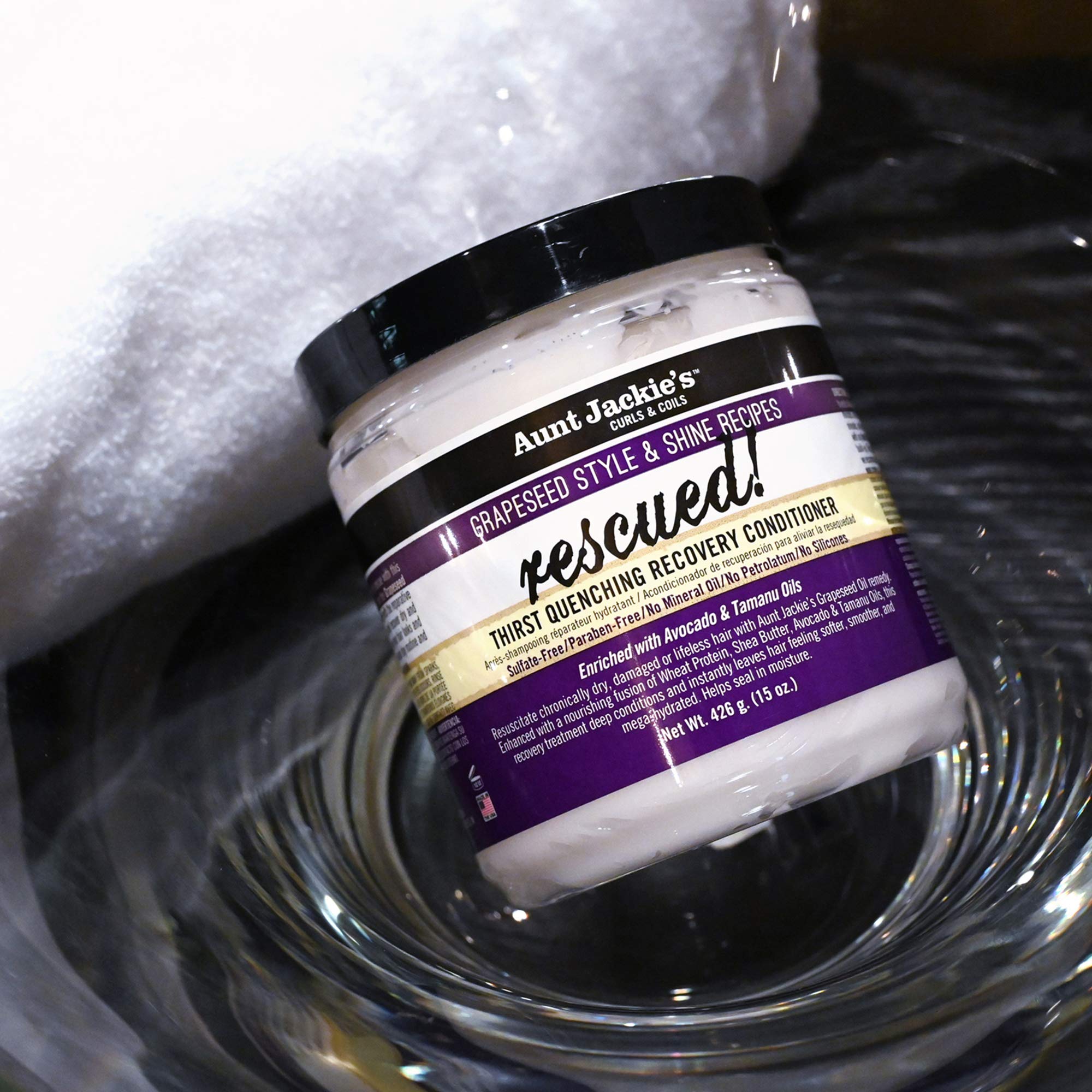 Aunt Jackie's conditioner applied to curly hair, easing detangling and shine