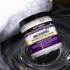 Aunt Jackie's conditioner applied to curly hair, easing detangling and shine