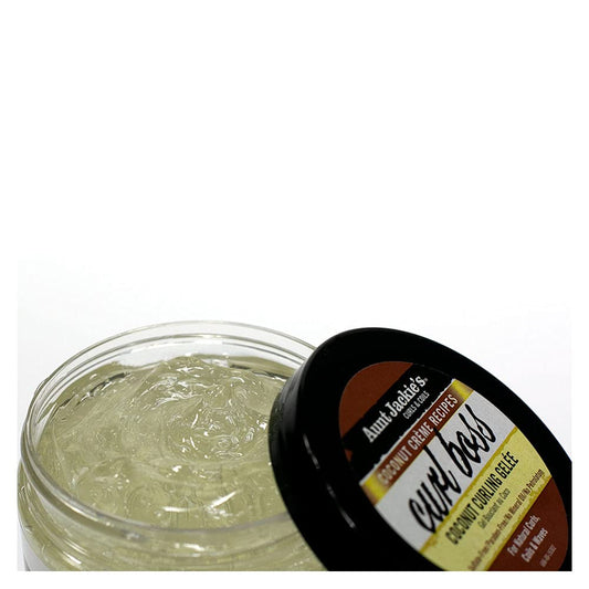 Aunt Jackie's gel being finger-applied to damp curls, defining texture and adding shine