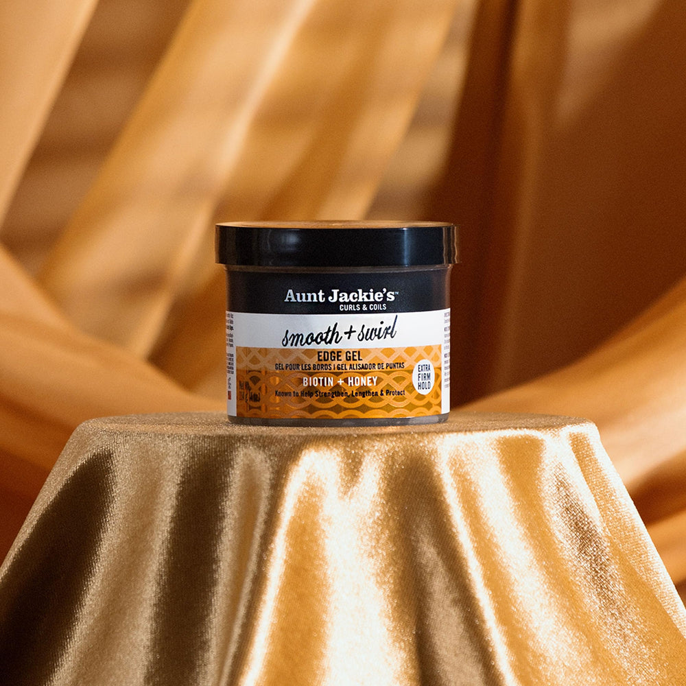 Aunt Jackie's gel used on braided hairstyle for neat, shiny hairline