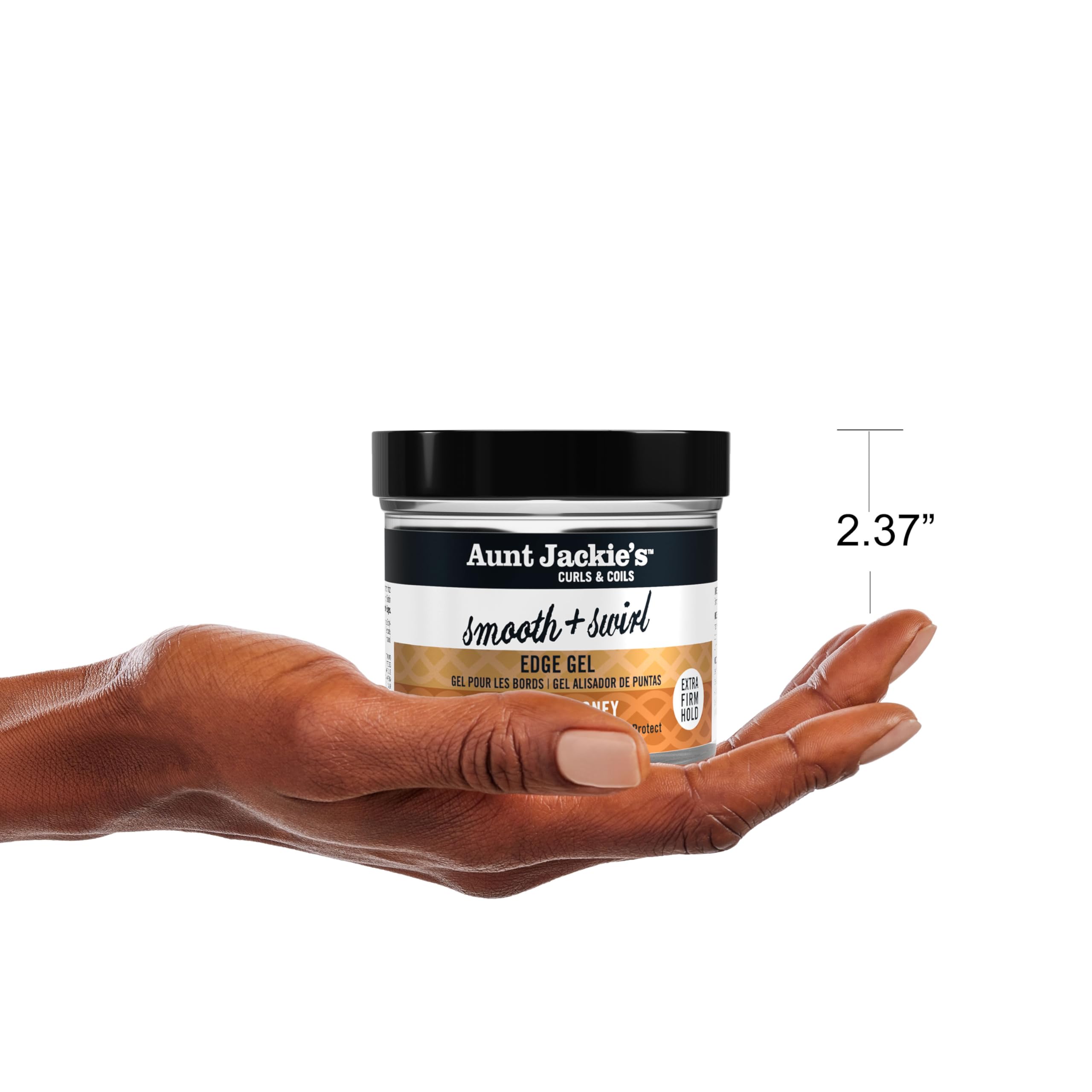 Aunt Jackie's 4oz jar next to a hand to show compact size