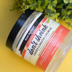 Close-up of flaxseed ingredient beside jar highlighting natural nourishment