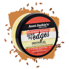 Hand holding Aunt Jackie's 2.5 oz jar to show compact, travel-friendly size