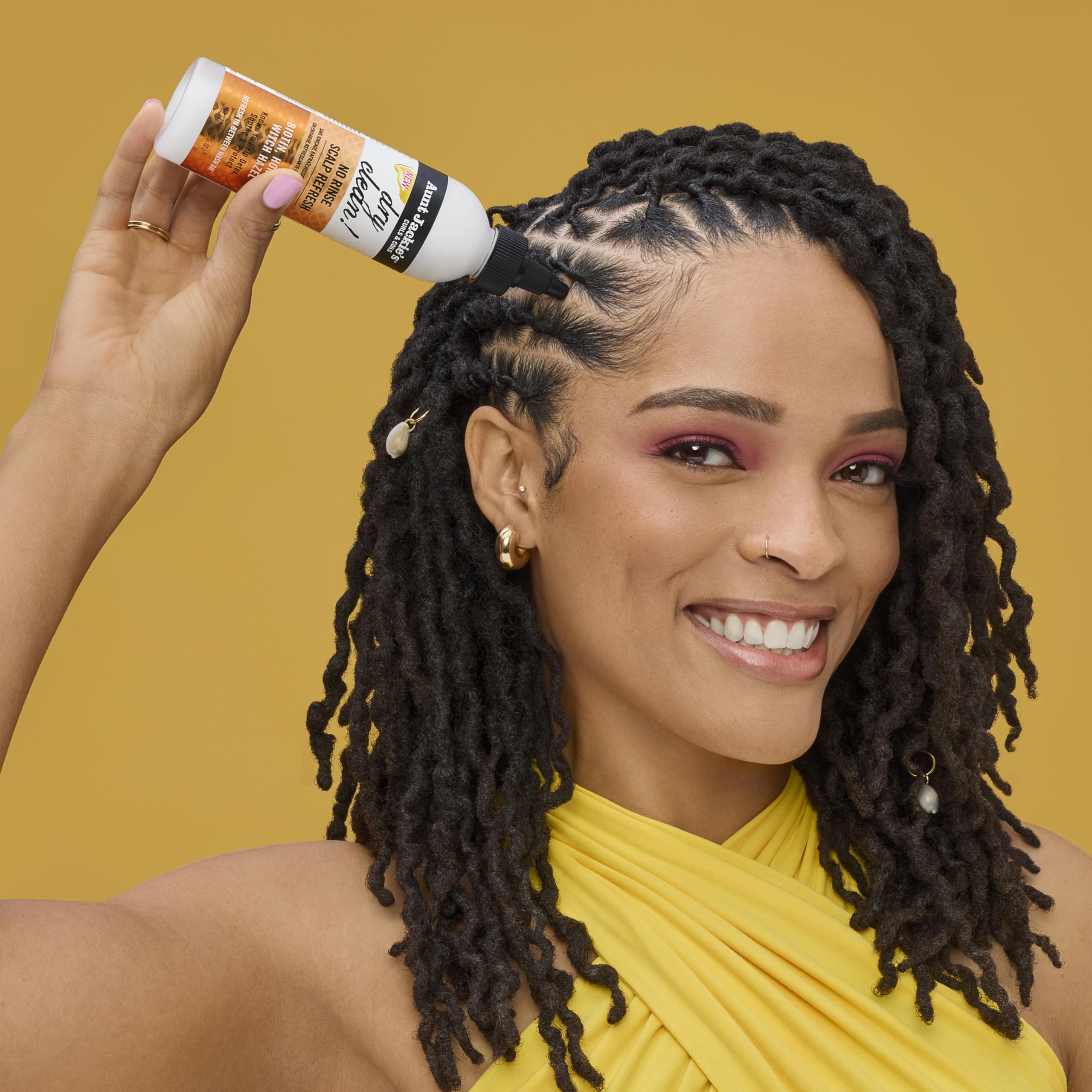 Aunt Jackie's spray focusing on scalp application to soothe and detox