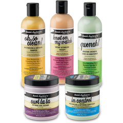 Aunt Jackie's stylist applying detangler to natural hair illustrating gentle professional handling