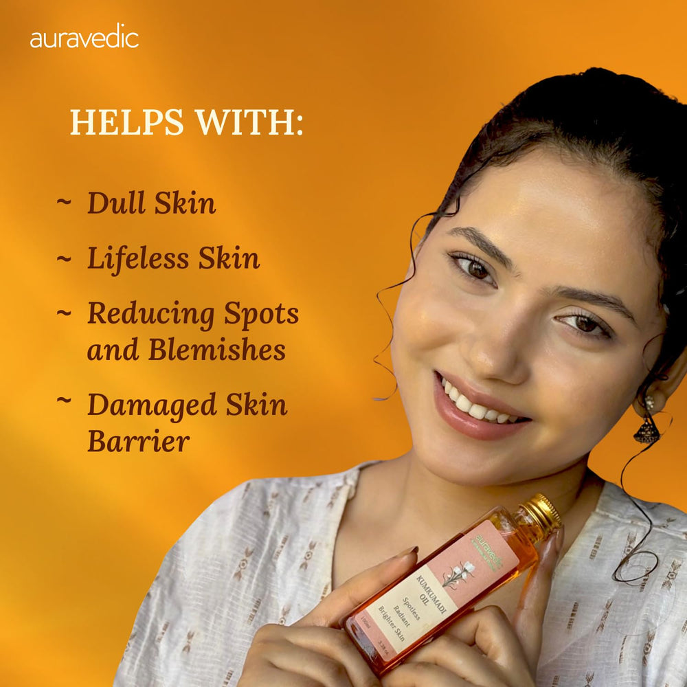 Auravedic hand applying oil to face showing gentle application and hydration benefit