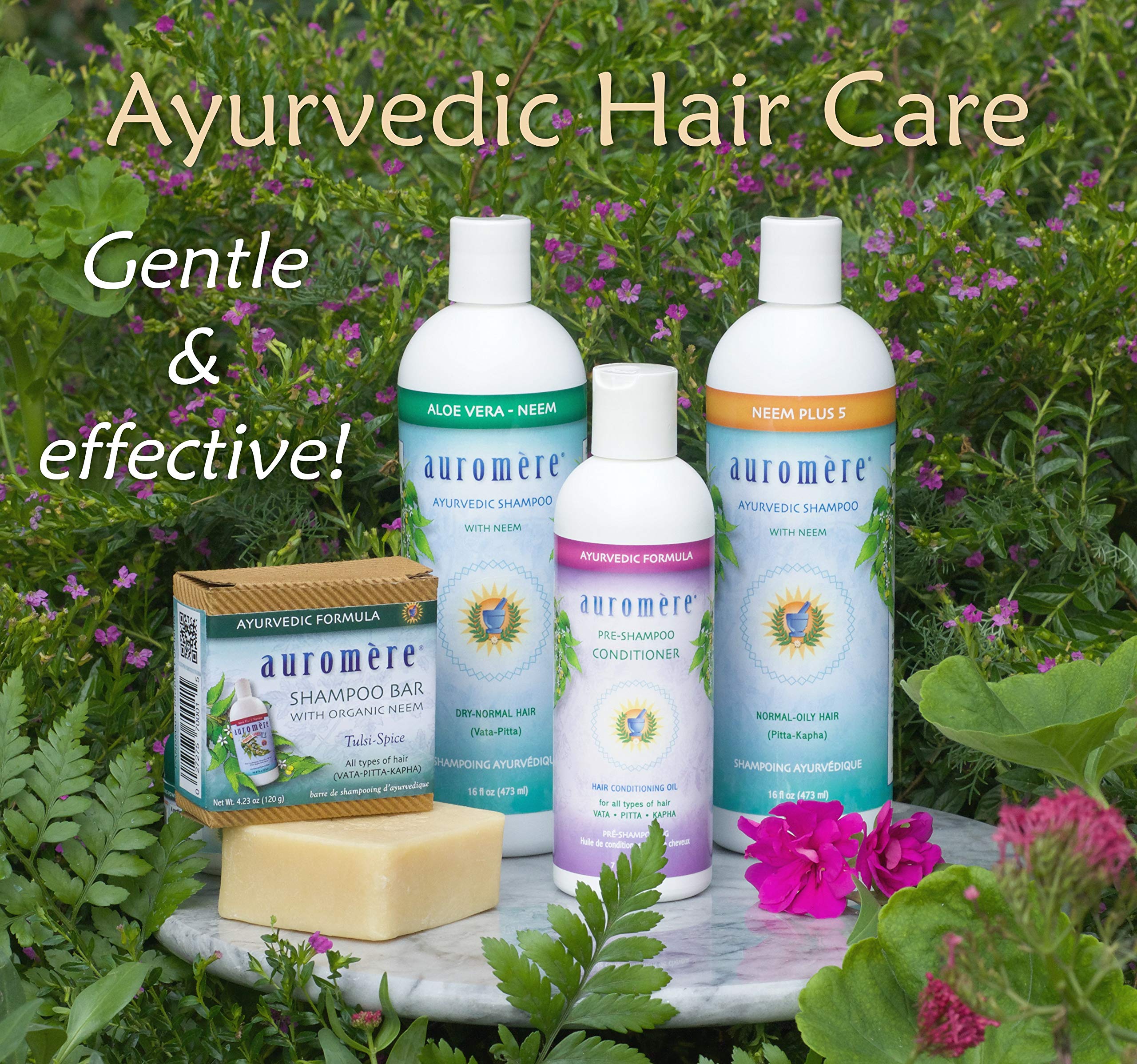 Auromere botanicals with aloe, neem, hibiscus highlighting natural ingredients