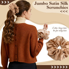 auroray holding a thick high ponytail securely without creasing