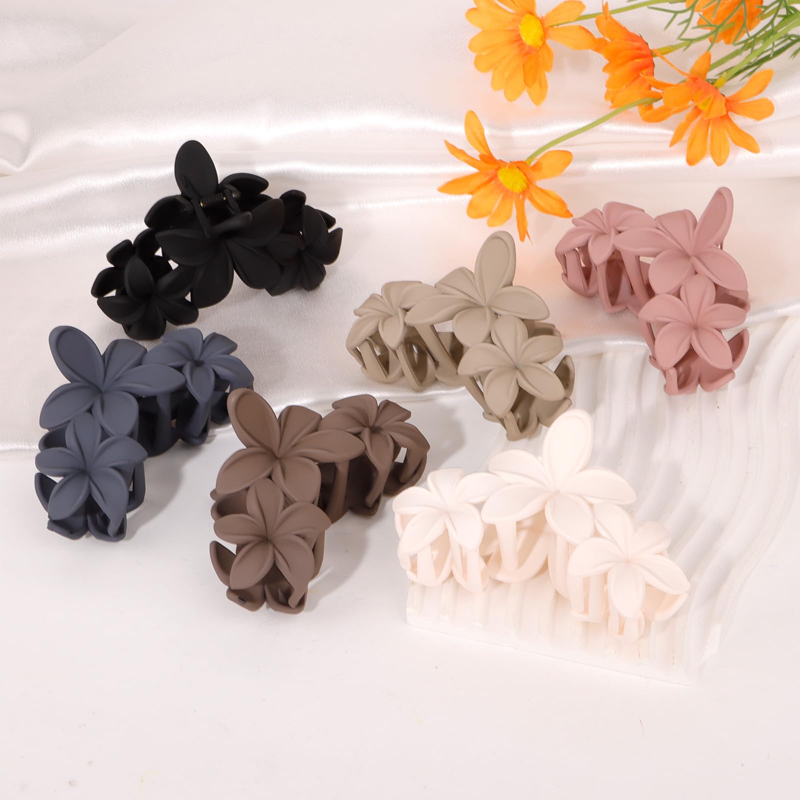 Aushamtai clips worn at the beach highlighting stylish, secure summer look