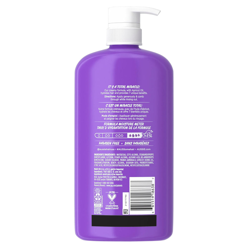 Aussie conditioner on bathroom vanity styled to show fragrance and lifestyle appeal