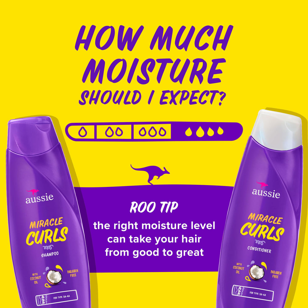 Aussie Miracle Curls detangling milk pour displaying lightweight slip to reduce breakage