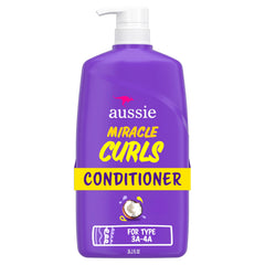 Aussie bottle front view showing Miracle Curls 26.2 oz, clear curl definition benefit