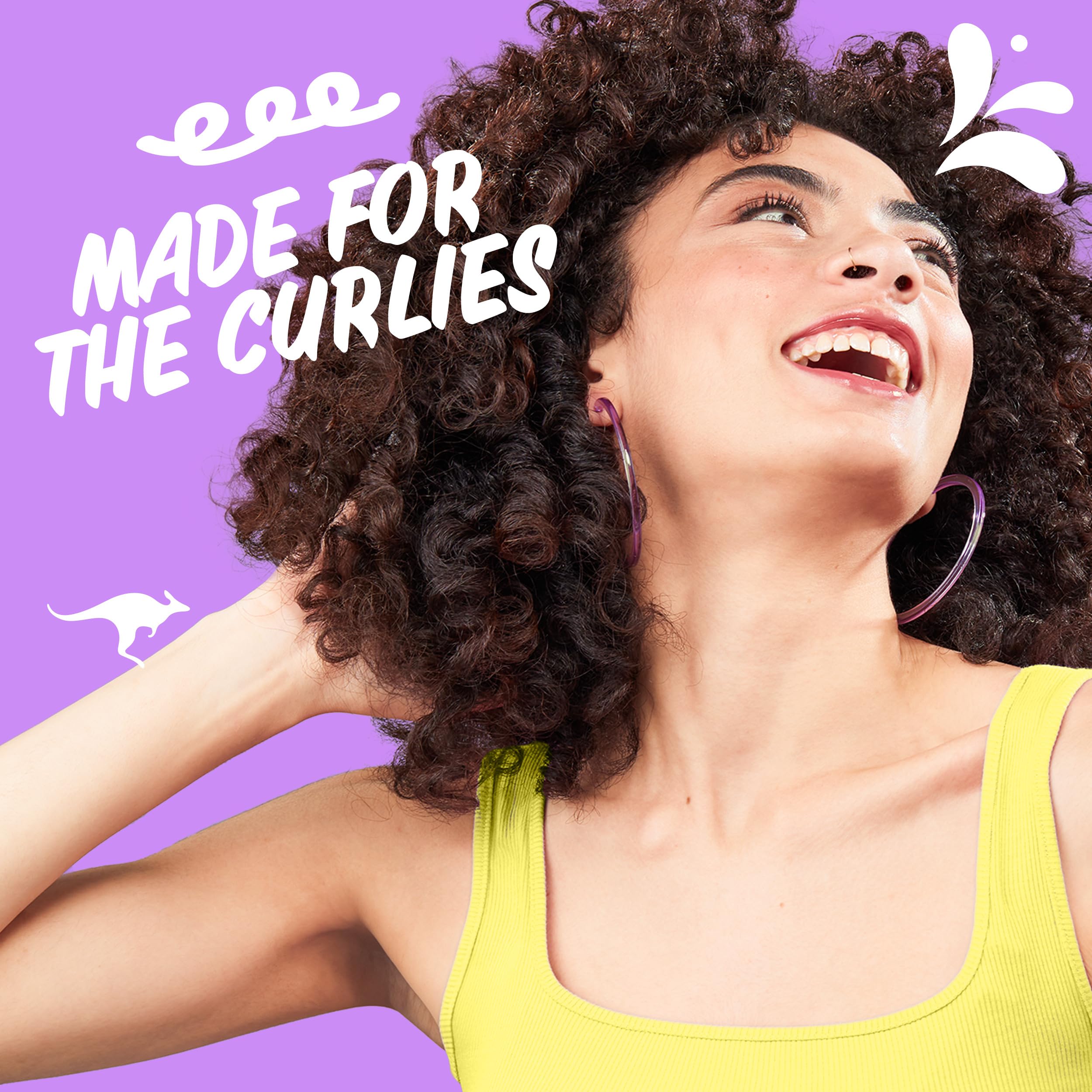 Aussie Miracle Curls curl refresher gel in hands scrunching for defined frizz control