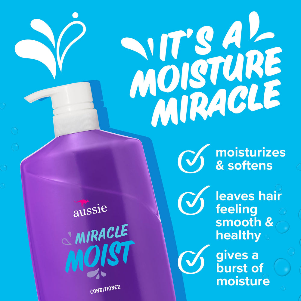 Aussie conditioner pouring to show thick consistency that helps detangle and hydrate