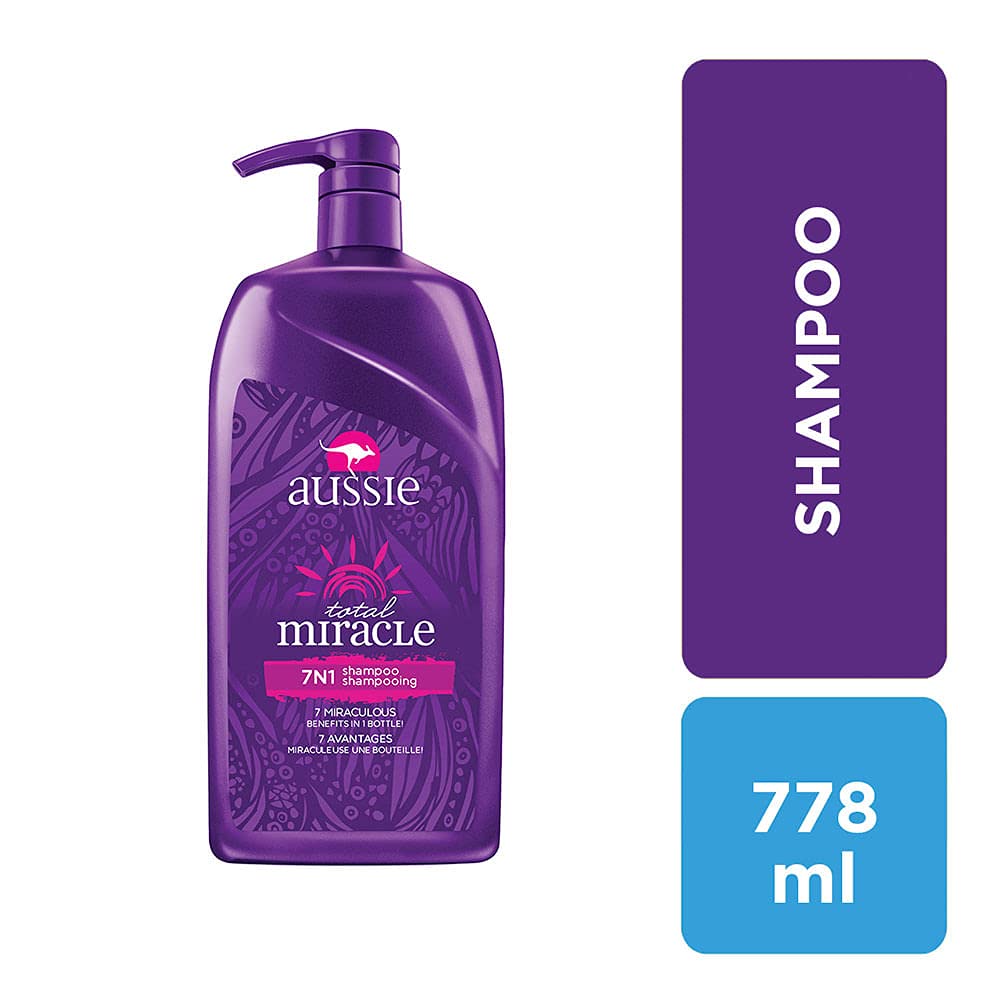 Aussie shampoo in-shower use with lather showing gentler cleanse and detangle benefit