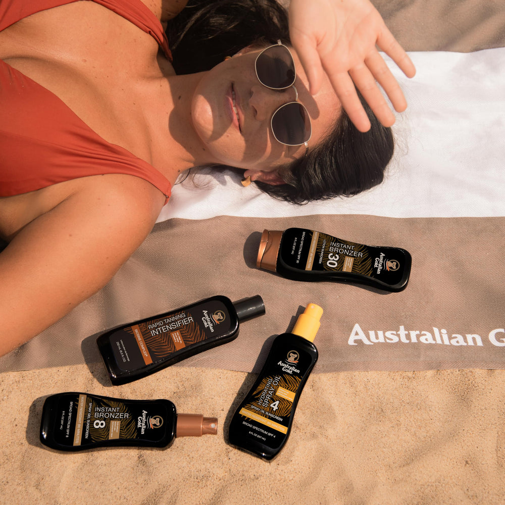 Australian Gold bronzed skin detail showing instant tint and smooth hydration