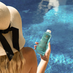 Australian Gold applied to sunburned shoulder offering visible cooling comfort