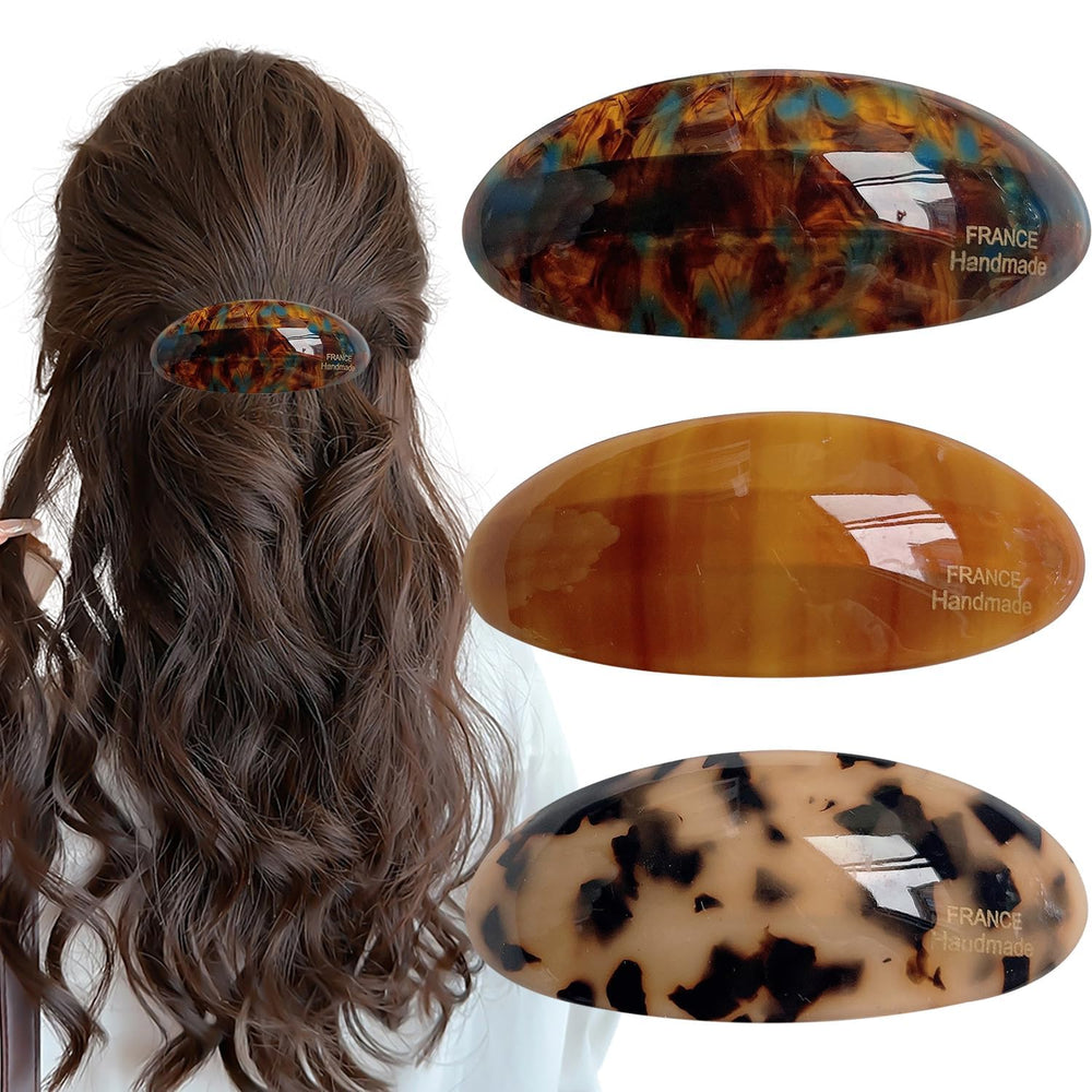 Auswalar front view of three acetate barrettes showing tortoise pattern and glossy finish for fashionable hold