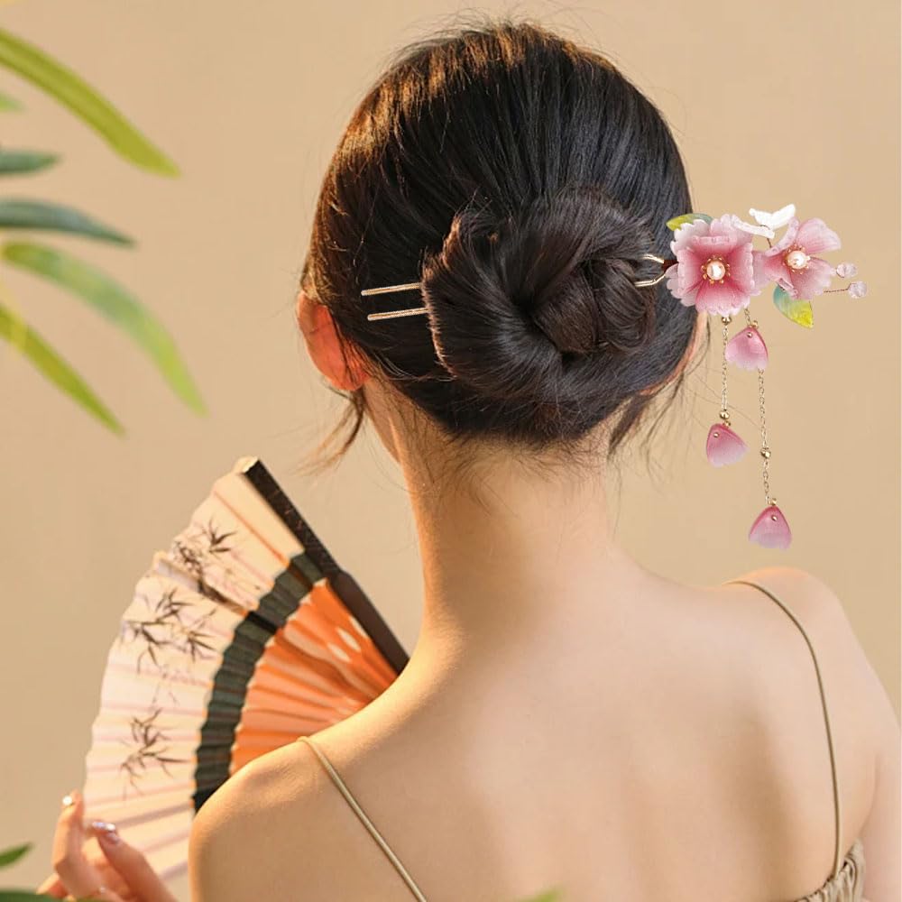 Auswalar hairpin in a bun lifestyle shot adding vintage charm and styling inspiration