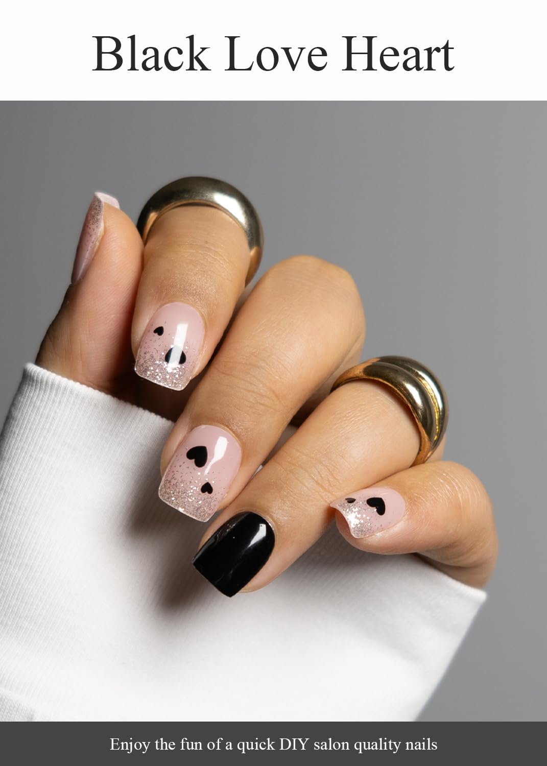 AutyaMee cured nails with glossy finish on black heart design, delivers salon shine