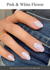 AutyaMee close-up of pink and white daisy pattern on gel strip highlighting precise floral detail