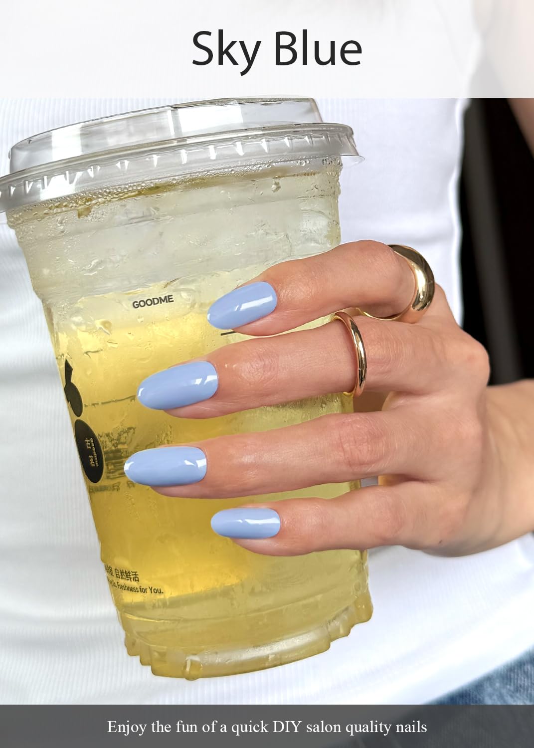 AutyaMee cured sky blue nails in a lifestyle shot demonstrating glossy long-lasting wear