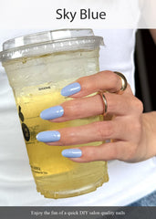 AutyaMee cured sky blue nails in a lifestyle shot demonstrating glossy long-lasting wear