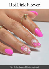 AutyaMee finished manicure on hand showcasing hot pink flower style for instant polish upgrade