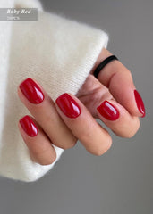 AutyaMee close-up of ruby red gel strip texture highlighting flexible semi-cured gel benefit