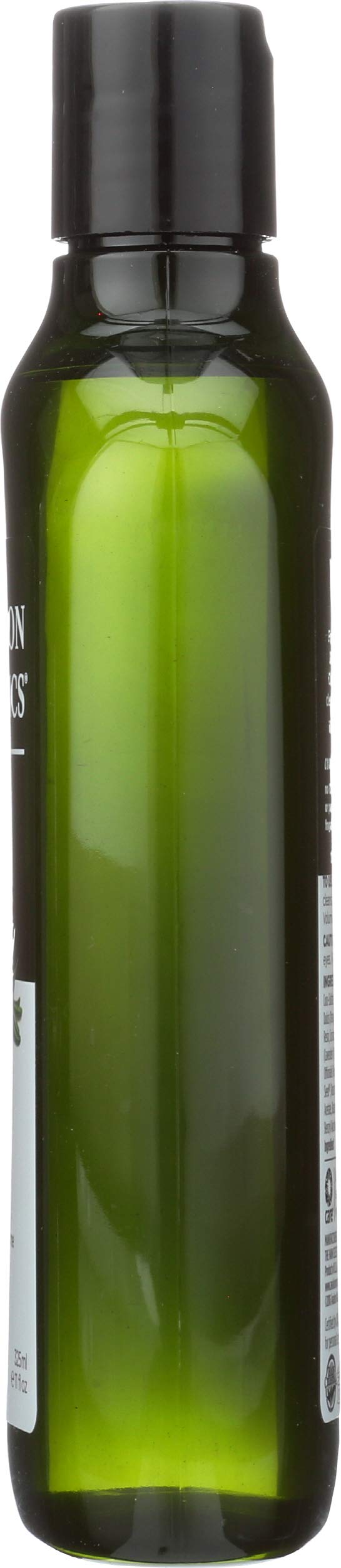 Avalon Organics bottle beside fresh rosemary sprig emphasizing botanical freshness