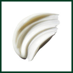 Aveda Be Curly bottle beside a hand showing 8.5 fl oz scale