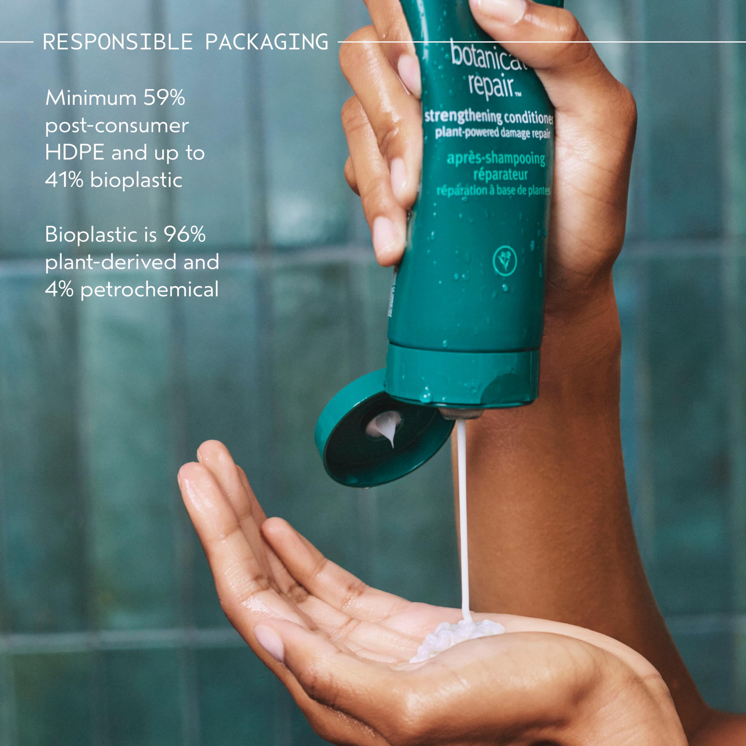Fresh botanicals beside Aveda bottle highlighting plant-derived ingredients