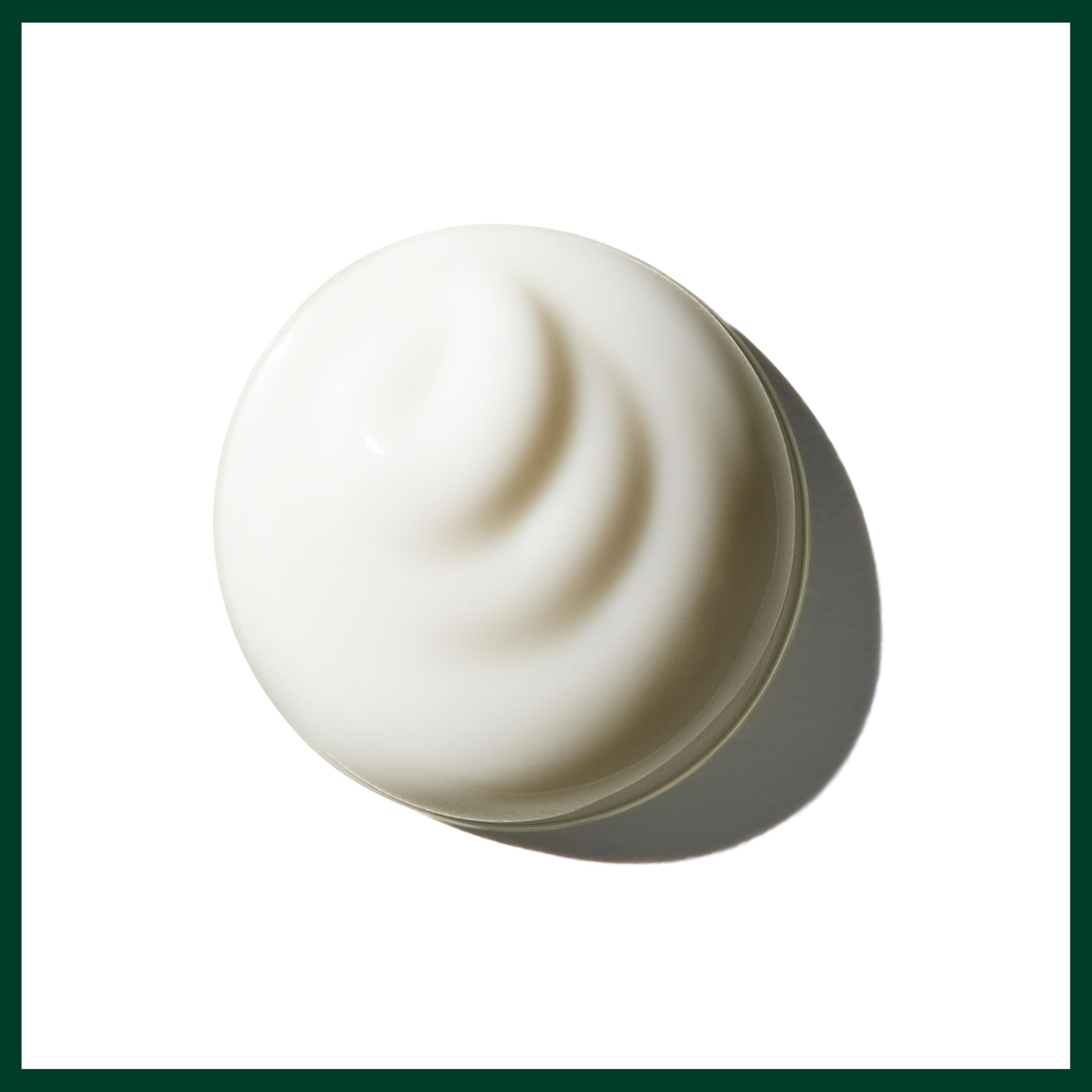 Aveda brilliant creme after blow-dry showing smooth, shiny curls and polished finish benefit