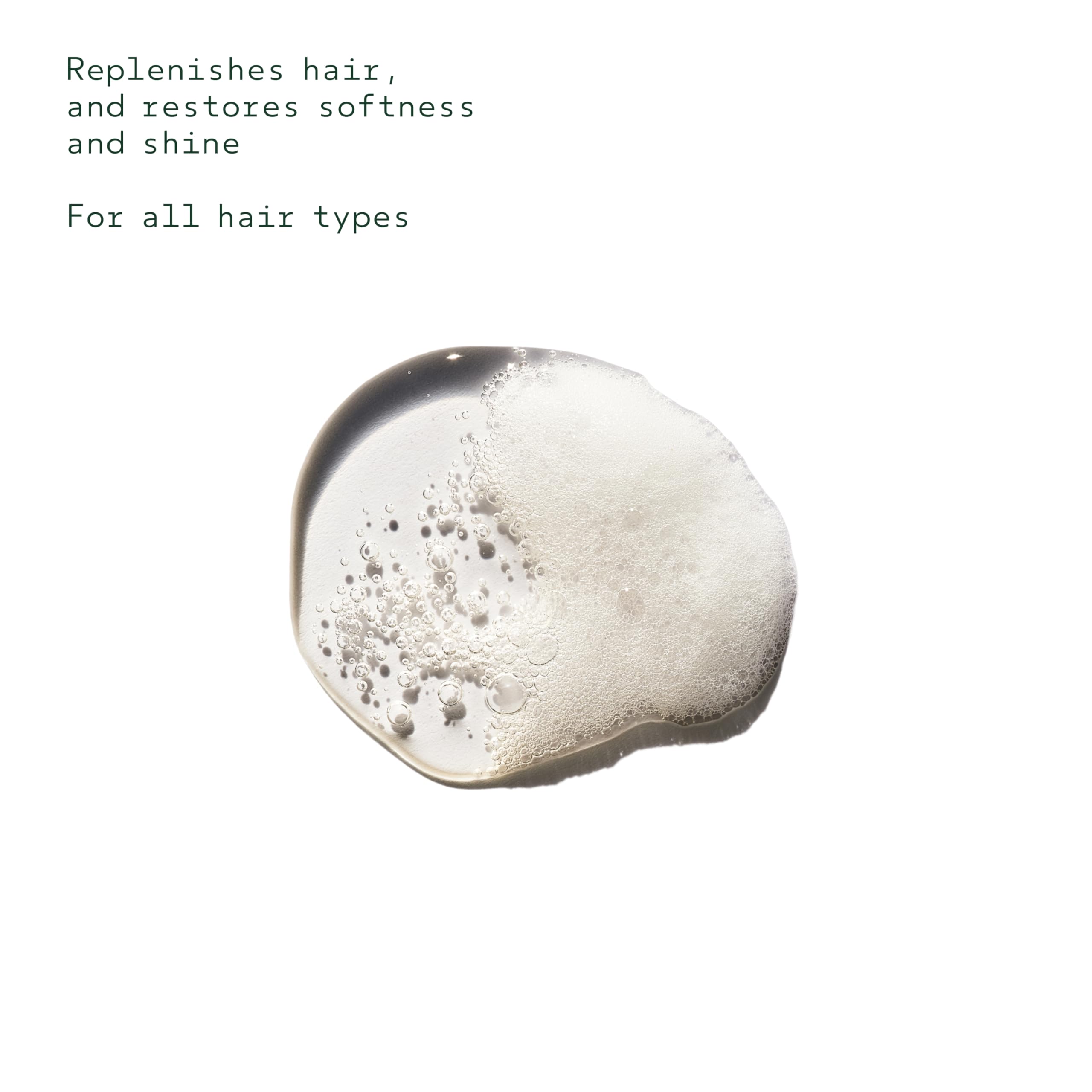 Aveda shampoo in hand during application showing easy use and scalp cleanse