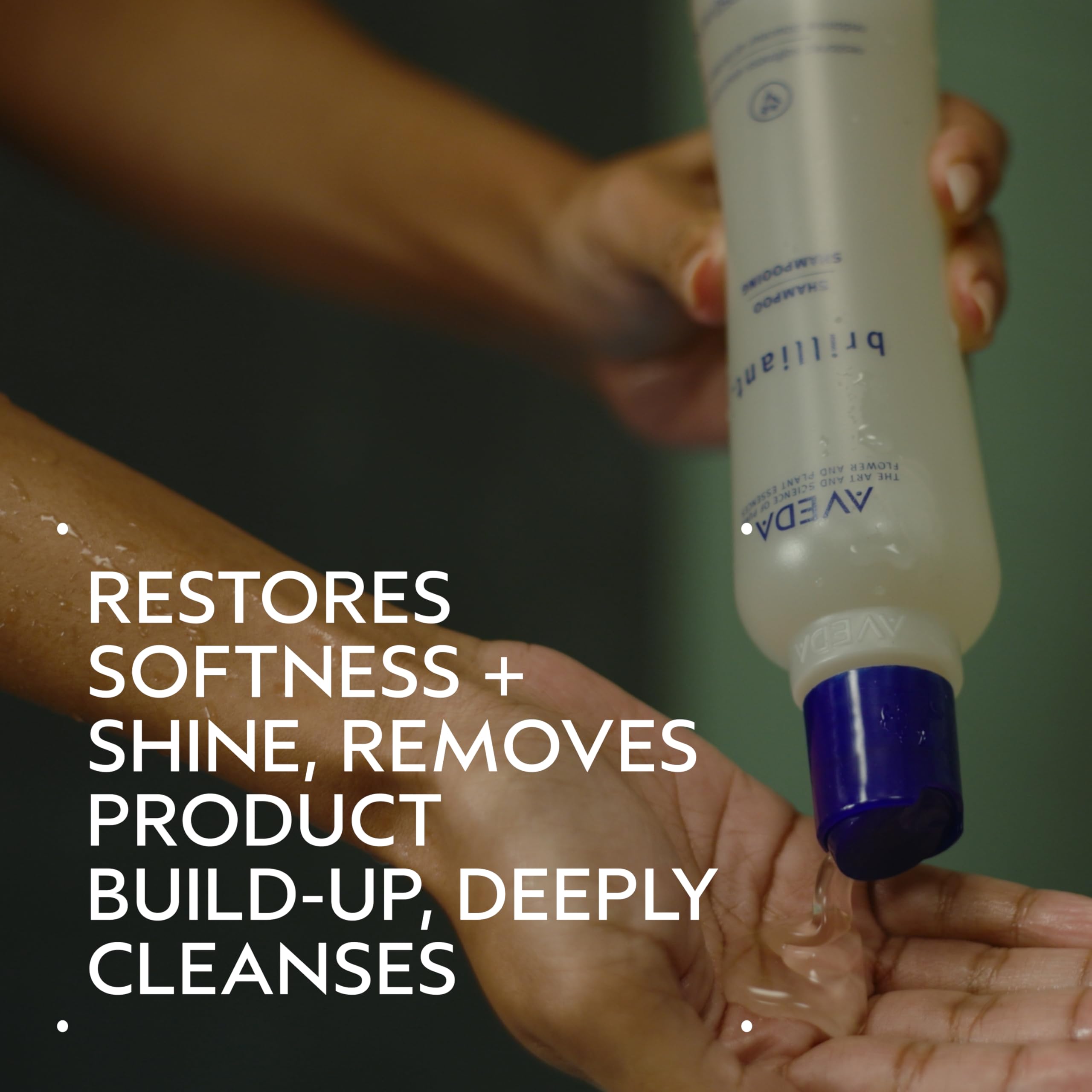 Aveda label close-up highlighting natural ingredients and clarifying benefit