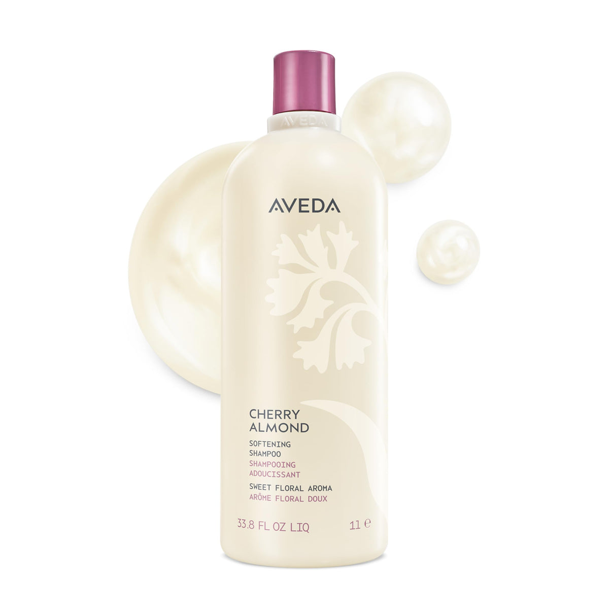 Aveda Cherry Almond bottle front shows label and salon-sized benefit