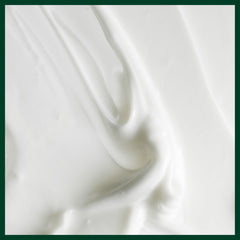 Aveda conditioner on shower shelf suggesting daily use convenience