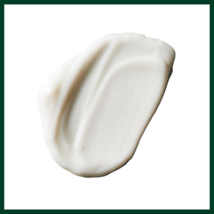 Aveda lotion spread on hand, demonstrates fast absorption and non-greasy feel
