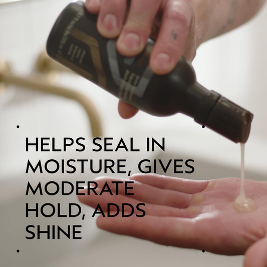 Aveda liquid pomade texture pouring to show lightweight, spreadable formula
