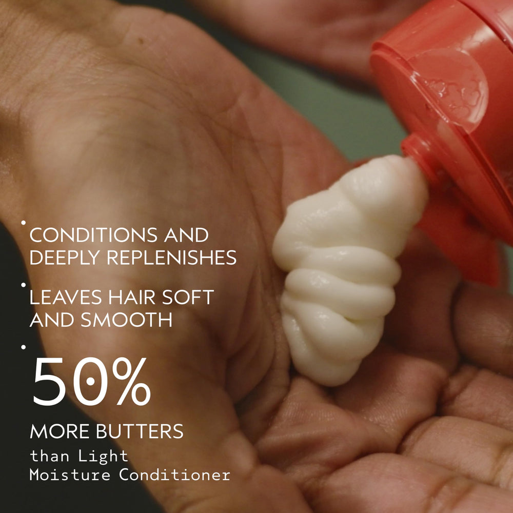 Aveda conditioner opened nozzle showing cream ready to dispense benefit