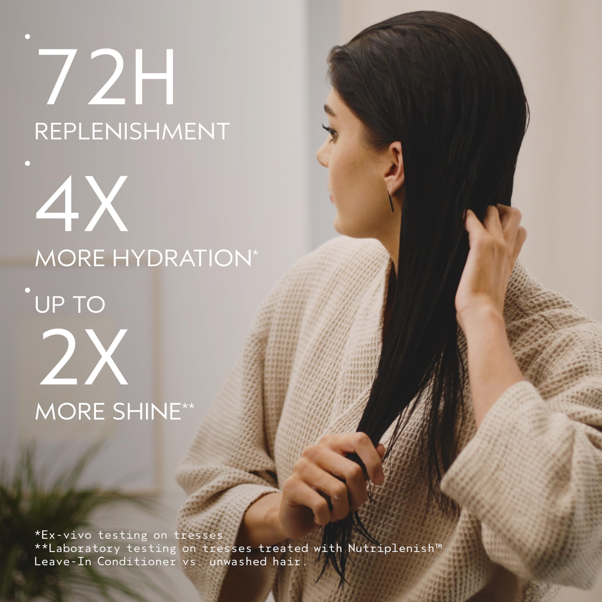 Aveda Nutriplenish mist spraying onto hair to hydrate and detangle instantly